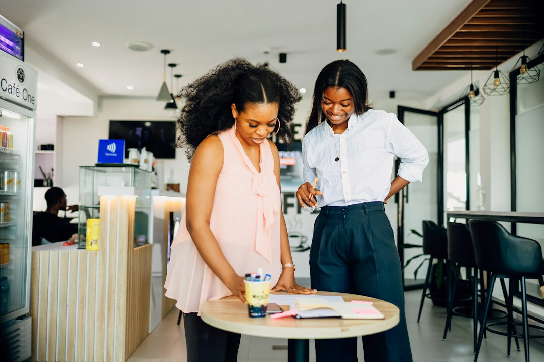 confident businesswoman at negotiation table