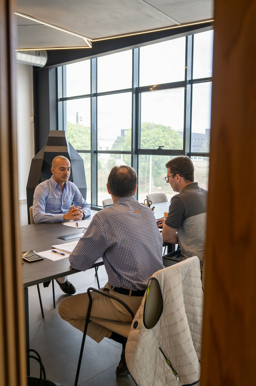 business professionals negotiating at table