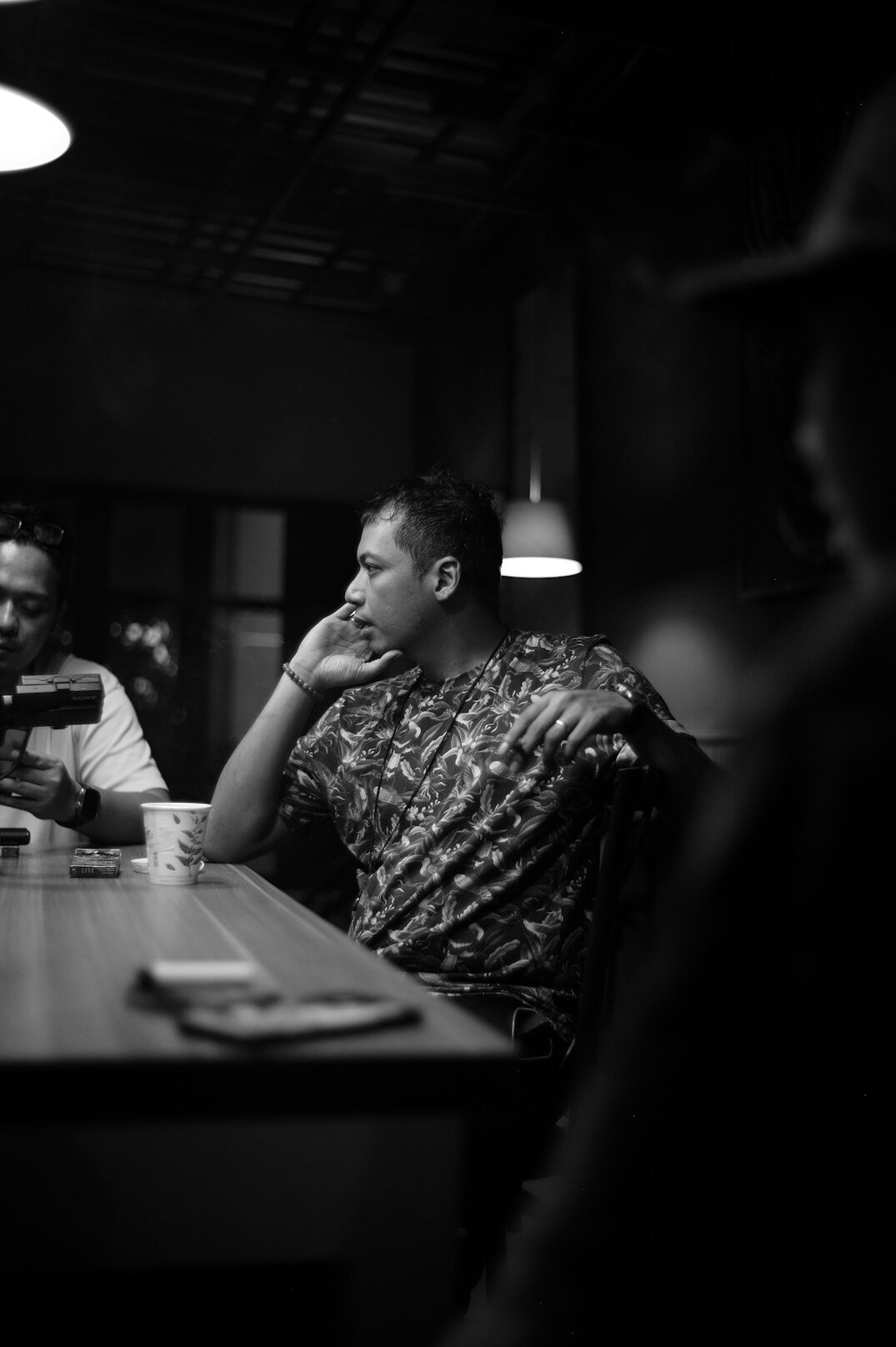 person thinking during meeting