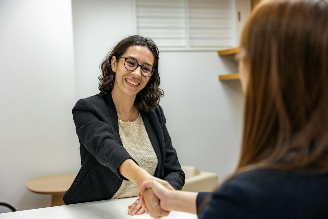 confident woman negotiating in office